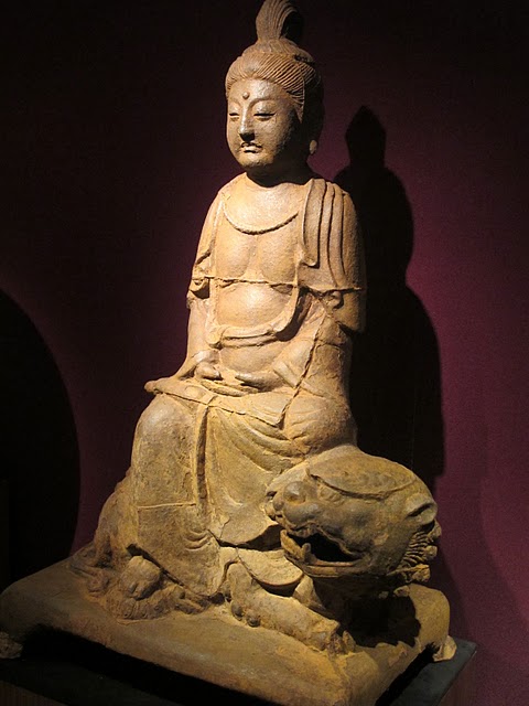 Rare Large Cast Iron Fgure of Manjsuri Riding upon a Lion